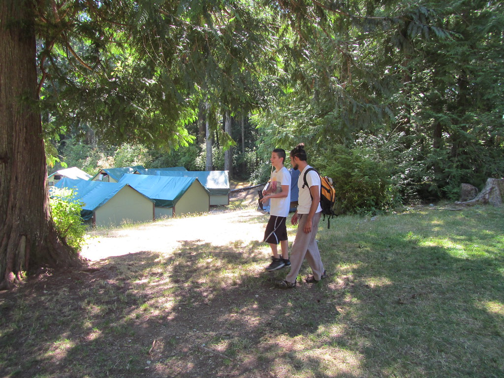 Camp tents nestled under the trees